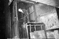 Leo Weisensel prying the cage loose. (1982)