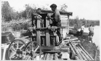 Gene Germain working on motor