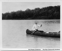 Unidentified man in canoe