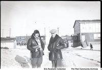 Two men in front of Main Office