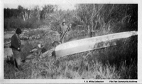 Two men and canoe c 1927