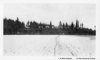 Shore line tent camp on frozen lake 