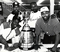 Four professional players with Grey Cup