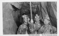 Three miners and drill very early thirties