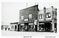 Main Street with Lamont's Hardware and Thompson's Electric