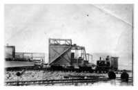 Rail construction gravel spreader