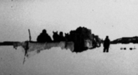 Horses pushing a plow over the ice about 1933