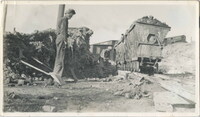 Two Men Clearing Rubble 
