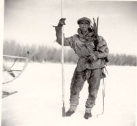  Ira or Sidney Burleson with his trapping gear 1942