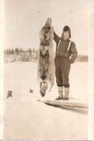  Trapper Presenting a Wolf Pelt 1920s