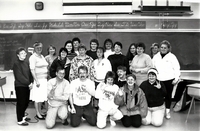 Special Olympics group photo in classroom.
