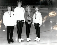 Jason Bernhard, Lisa Danis, Laura Bolton, Rachel Bolton with medals.