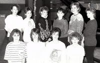Group of young ladies (skaters ?) posing.