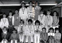 Group of youngs girls with their skating medals.