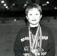 Jasen Bernhard with many nedals around his neck