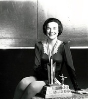 Tracy Petrychko posing with skating trophy