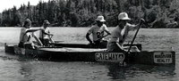 Paddlers in canoe race.