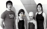Group of young swimmers with instructor.