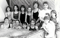 Group of swimmers in hot tub.