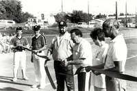 (L-R) ?, ?, Terry Brown, ?, ?, Nazir Ahmed. Ribbon cutting.