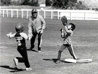 Boys baseball game action