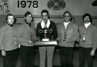 Don McElroy presents trophy.....