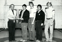 Jim McFarlane present trophy