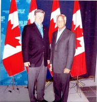 December 2005 from left to right: with The Honourable Steven Harper, Prime Minister of Canada, Nazir Ahmad, former Mayor 