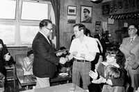 Clarence Kitson receives his Long Service plaque