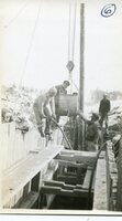 Escavating from Bottom of No 6 Section, The Material from which is being Dumped on top of Section No. 5