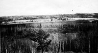 Mile 83 Before The Fire- The Large Building on the Left is Desjardins Where we Board" 1929