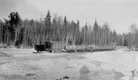 Lynn Tractor Hauling to Island Falls