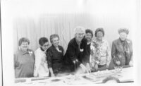 1970 Debbie Ellingson Doreen Church is cutting the cake,