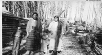 Native Women and Children in Camp