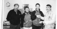 Walter Hatley presents cheque to Special Olympian Cross-Country Skier Jason Robinson