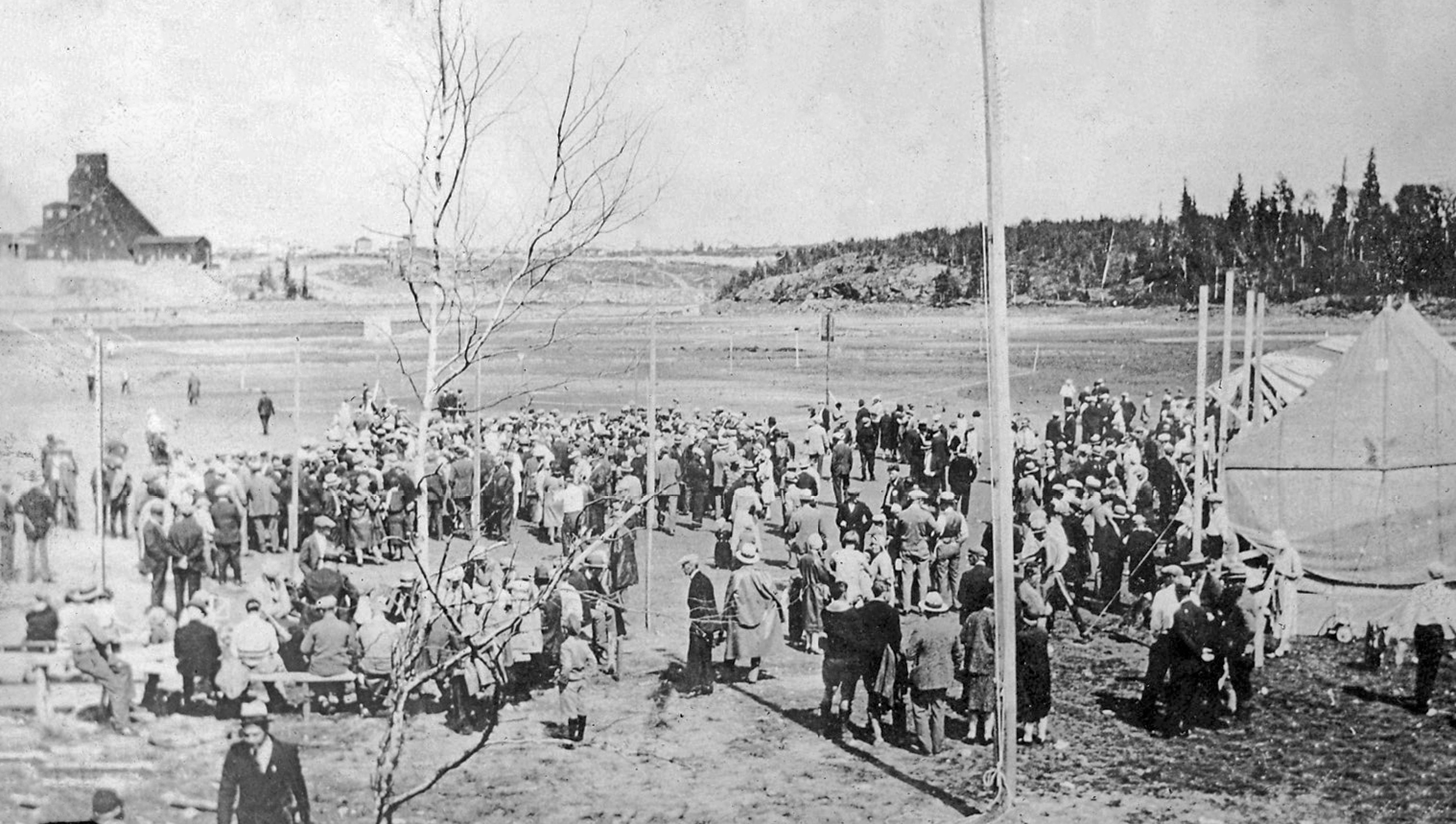 Group Gathering, on Pumped out Lake Bed , Main Shaft Visible in Background