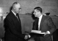 Frank Dembinsky Mayor of Flin Flon making a presentation to W. A. Green