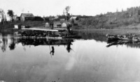 Appears to be Log Rafts arriving Mine Site, C 1927