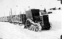 Tractor hauling cordwood, liley fuel for the Power House C 1927