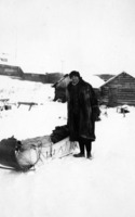 Unidentified Man with loaded Dog Toboggan Flin flon Camp C 1927
