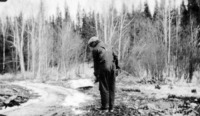 1927 Sprinkling water to Ice Logging Road North of Flin Flon
