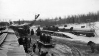 Loading Sleighs for the Freight Haul to Island Falls 1929 or 1930 Mile 86 "Power Siding"