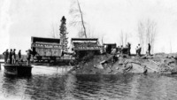 Narrow gauge dump cars.One end of trestle mounted on a barge C 1928