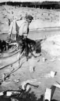 1929 Pneumatic Drill drilling holes for explosive to level construction site