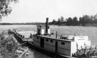 "The Tobin" with a Barge Load of Lumber C 1927