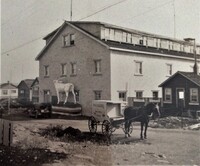 A horse-drawn P&G Bakery wagon