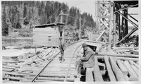 dam construction man seated