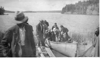 > portagers in canoe
