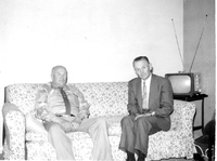 Rees Davis and man on couch