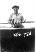 Rees fishing in canoe